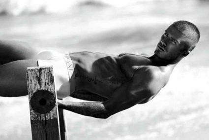 Beckham Arm And Side Stomach Tattoo